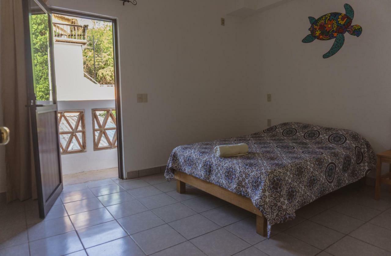 Nomad Beach House Hotel ปูแอร์โตเอสกอนดิโด ภายนอก รูปภาพ